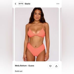 Skatie swim bottoms in guava ( bright coral). Brand new with tag attached.